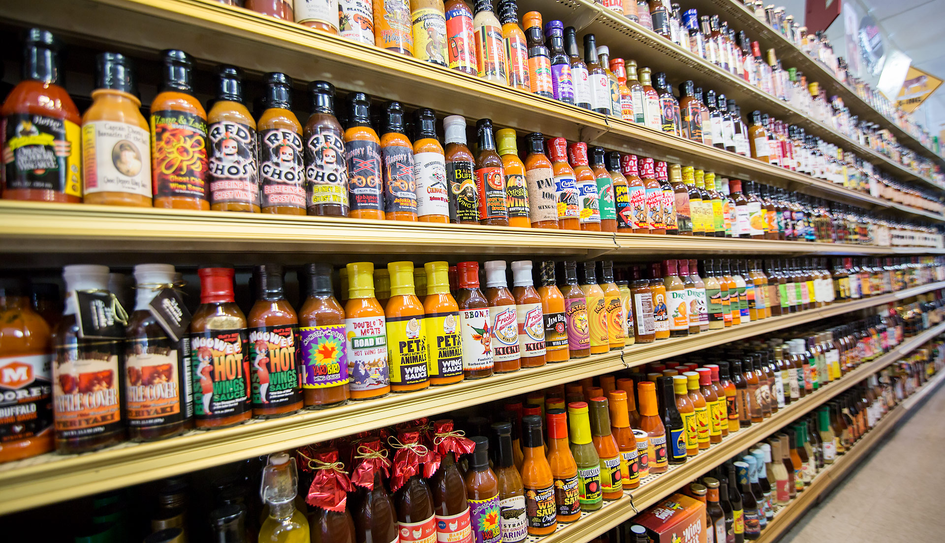 An Aisle of hot-sauces at Double DD Meats